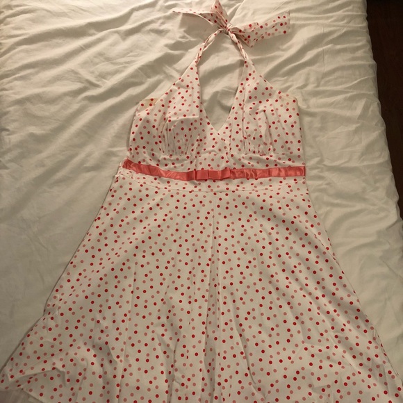 white dress with pink polka dots